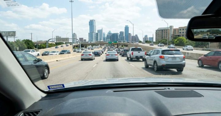 Driver maintaining safe following distance on Austin highway